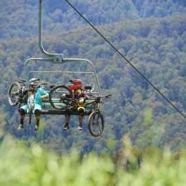 Ride High Country mountain bikers riding the chairlift at Mt Buller