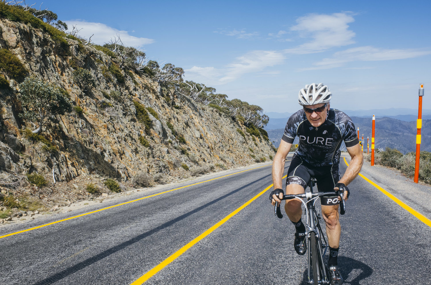 A cyclist riding up Mount Hotham for the 7 Peaks Ride